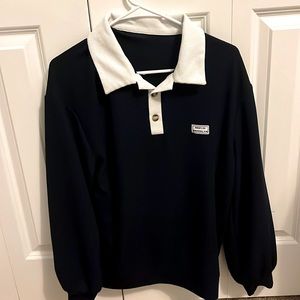 Dark Blue but looks like black